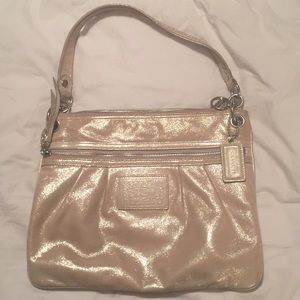 Gold coach purse